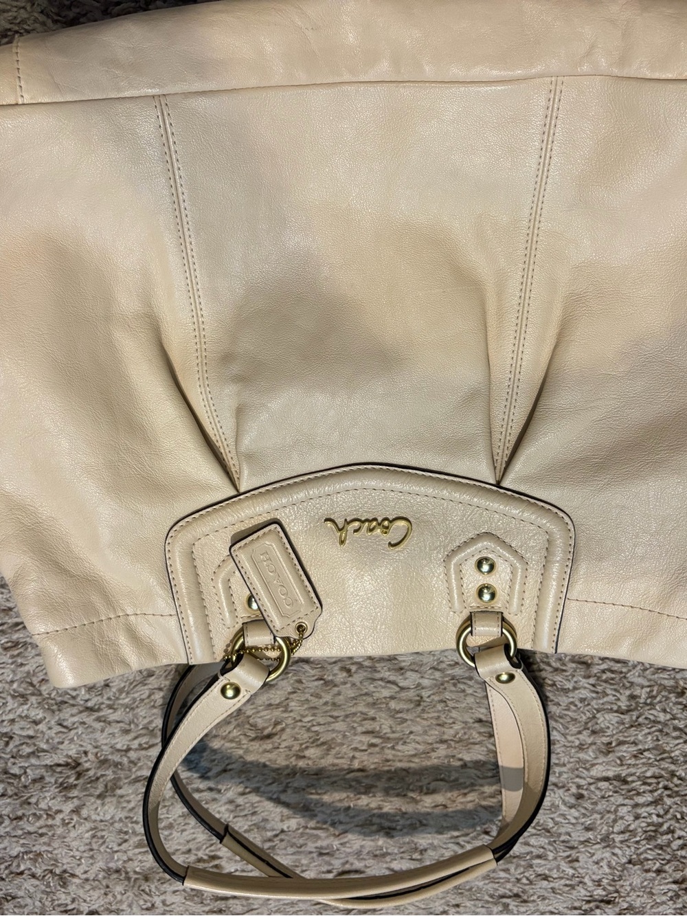 Coach Ashley Cream Leather Tote with Gold Hardware and shoulder strap.